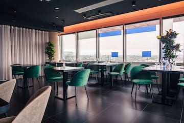 a room with tables and chairs