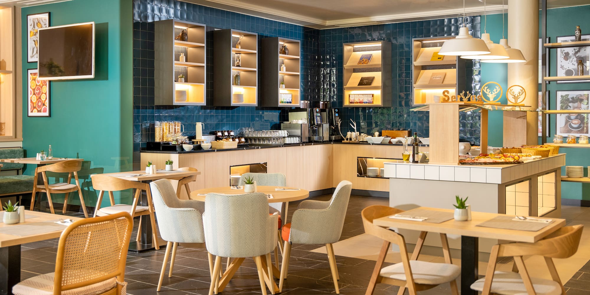 a room with blue walls and tables and chairs