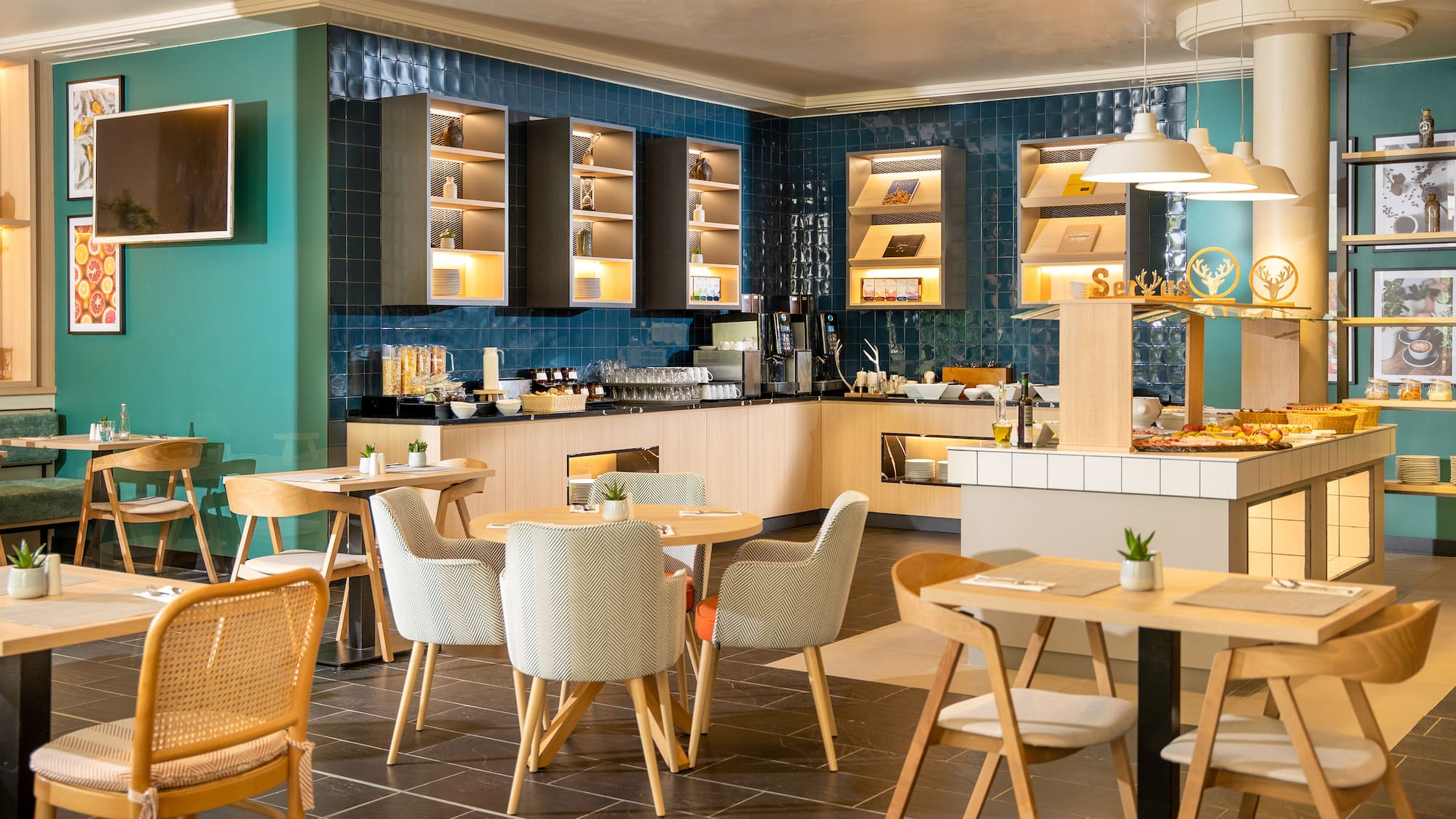 a room with blue walls and tables and chairs