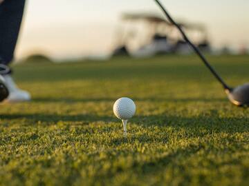 a golf ball on a tee
