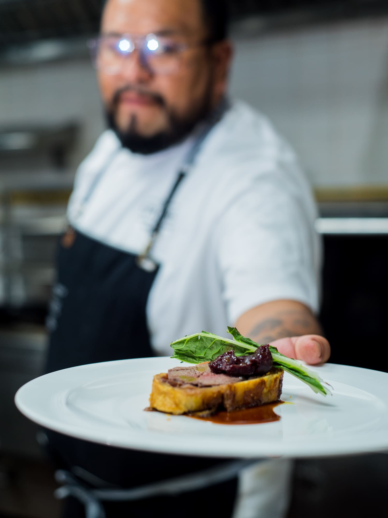 a man holding a plate of food