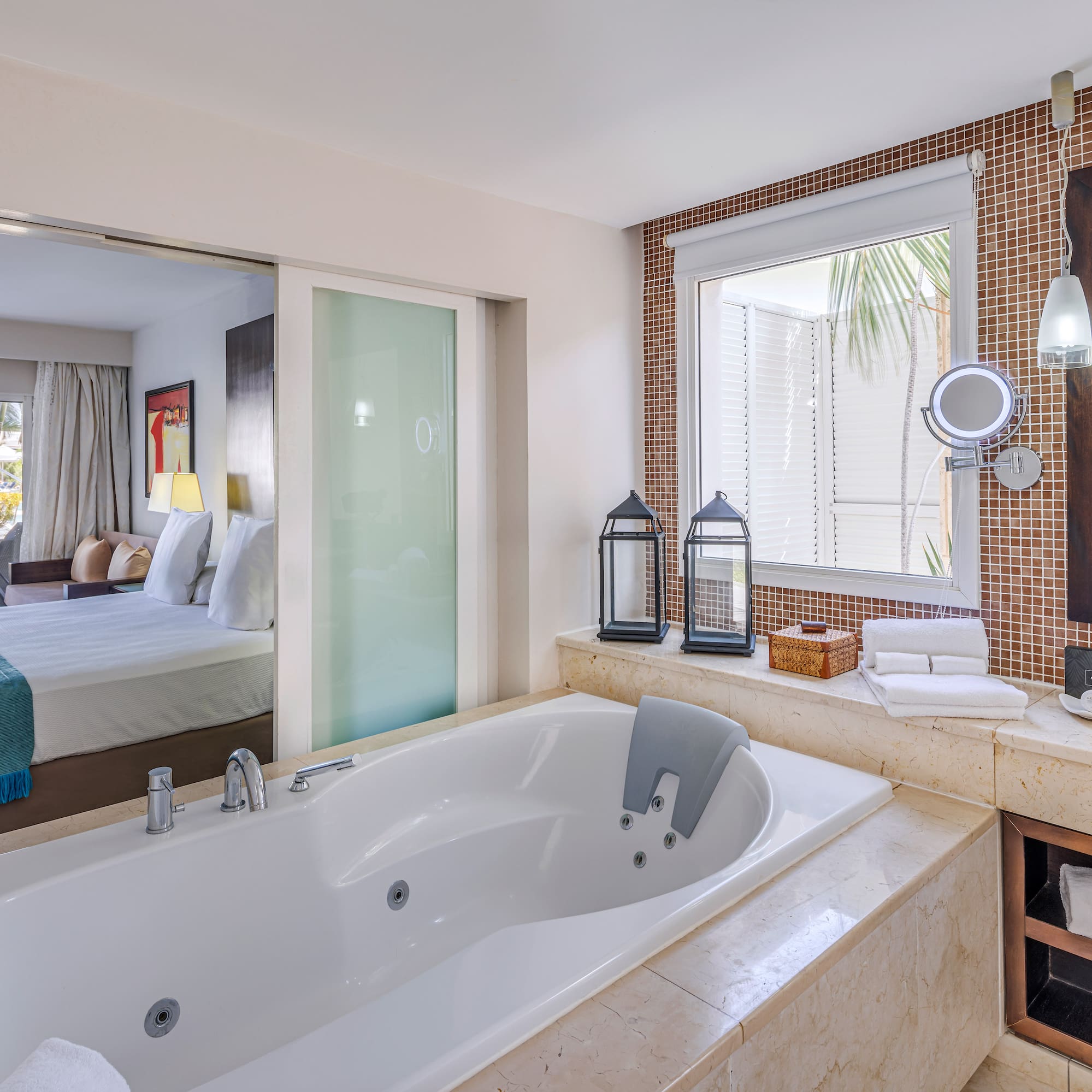 a bathroom with a bathtub and a mirror