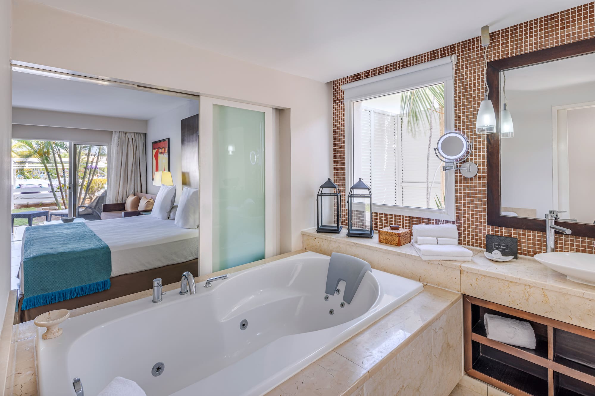 a bathroom with a bathtub and a mirror