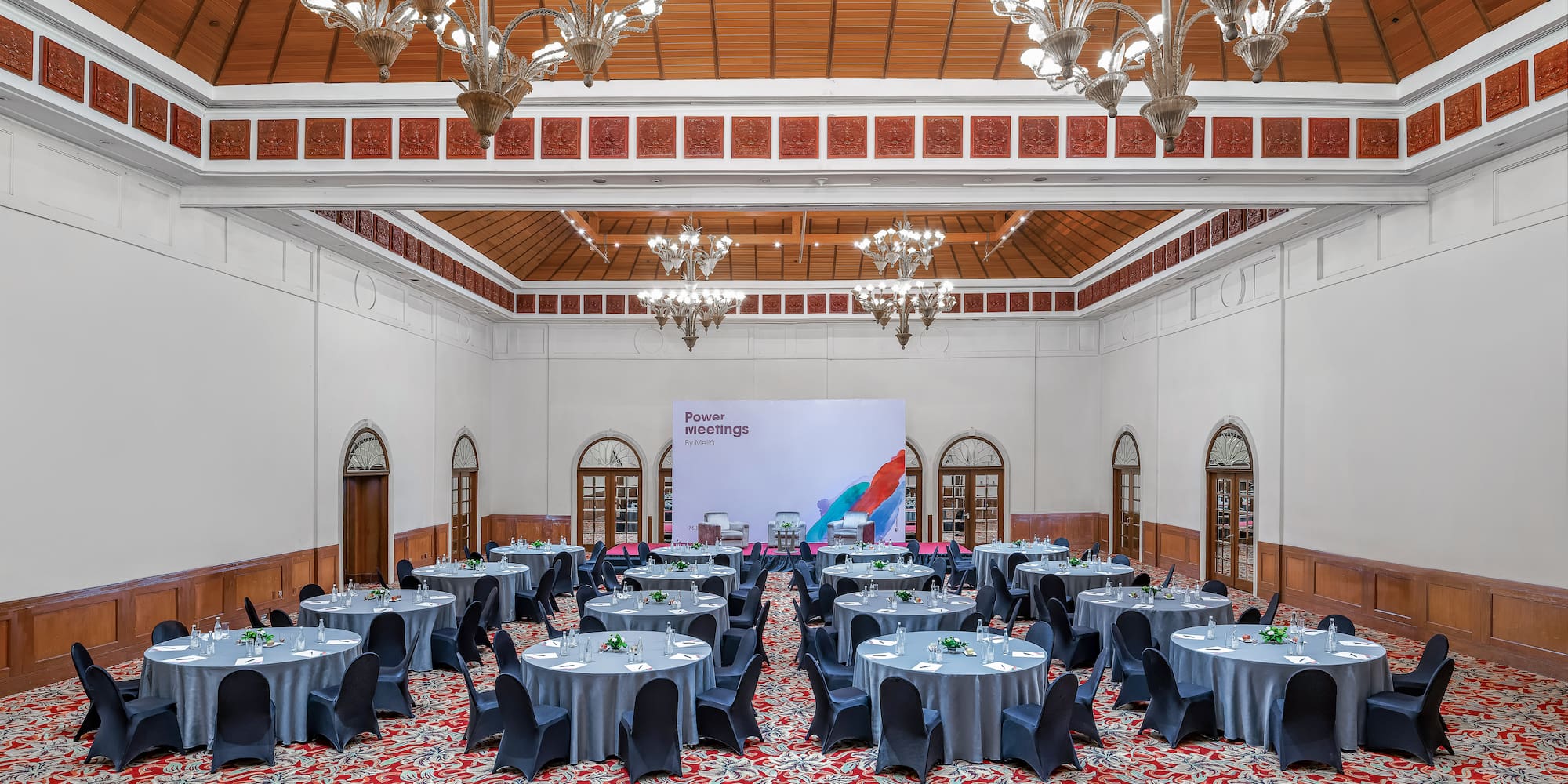 a room with tables and chairs