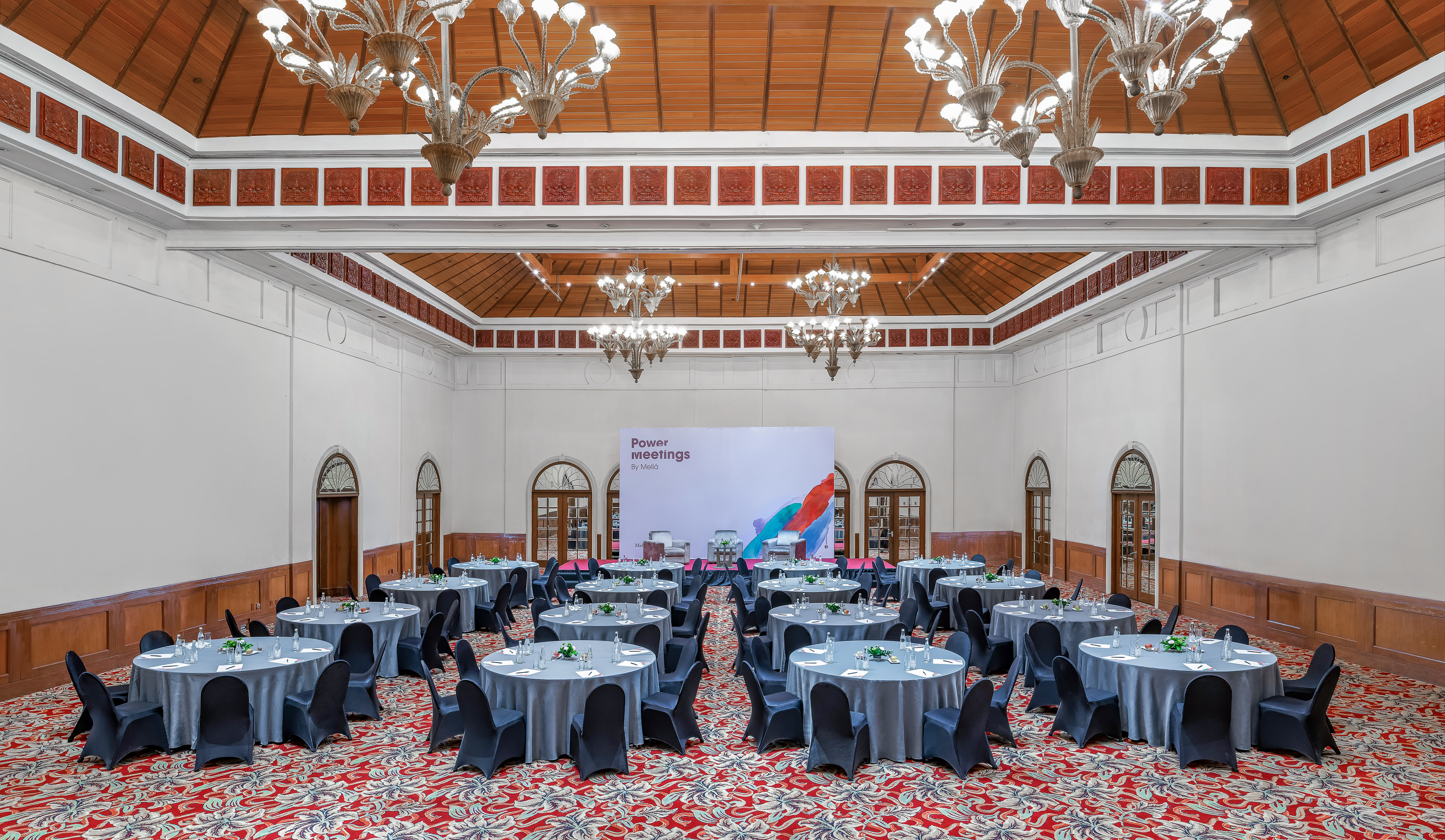 a room with tables and chairs