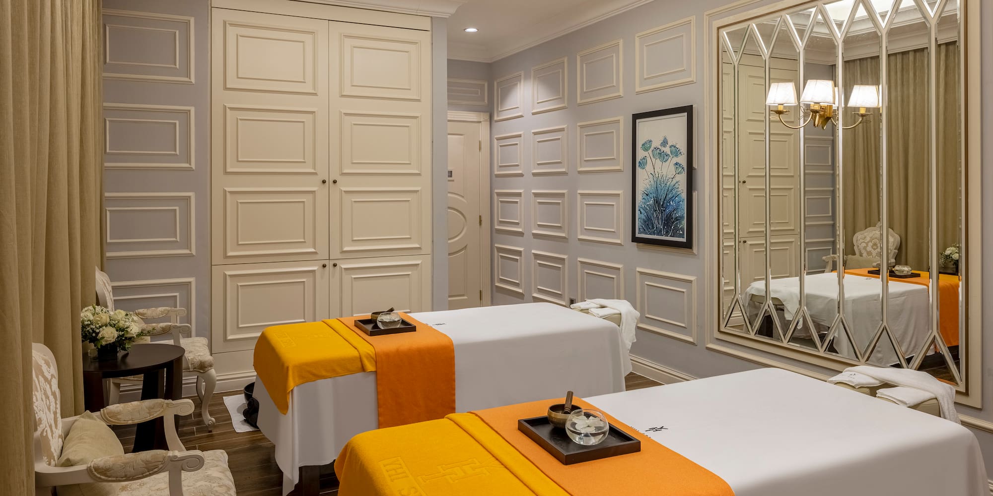 a room with white walls and a mirror