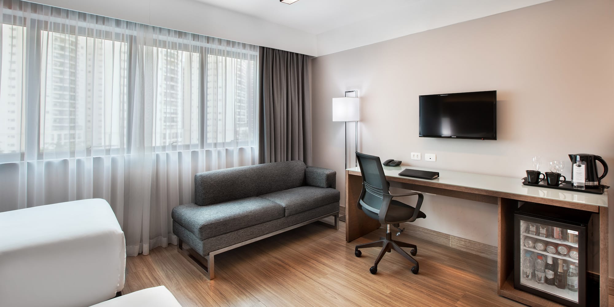 a room with a couch and a tv