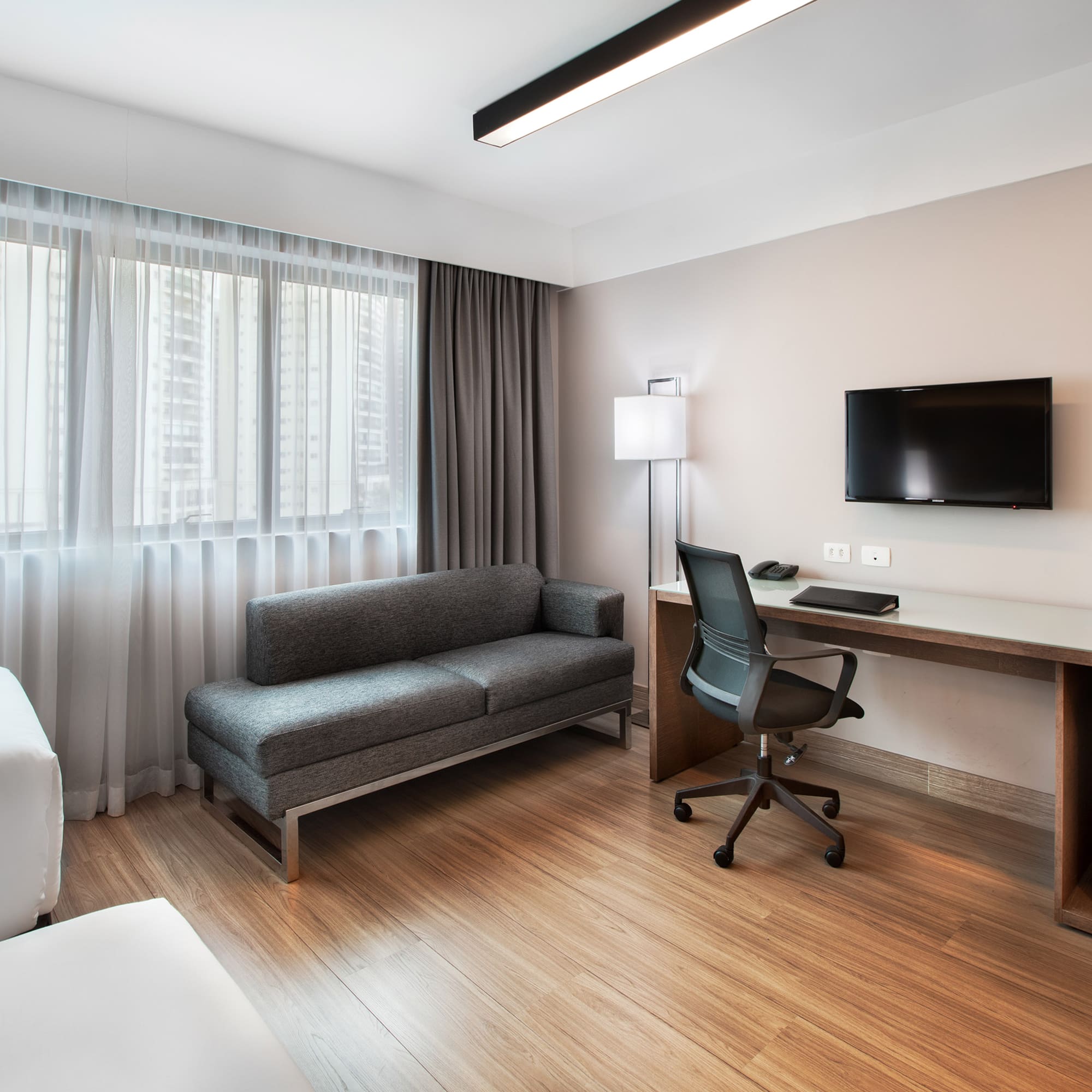 a room with a couch and a tv