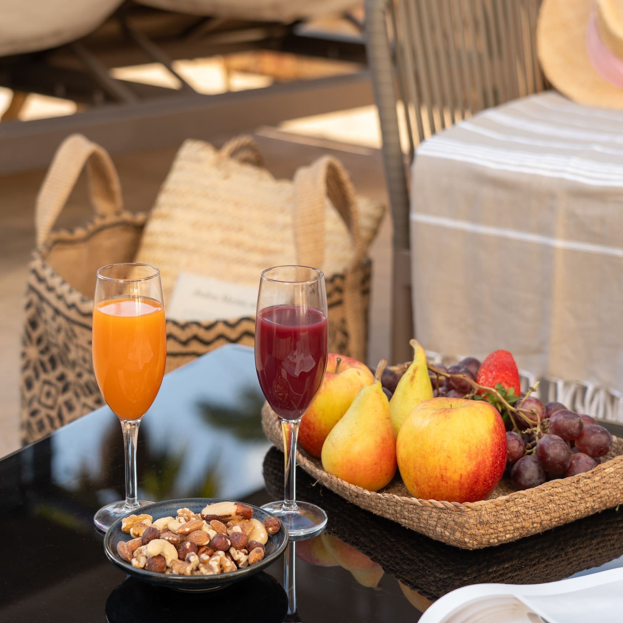 a fruit and juice on a table
