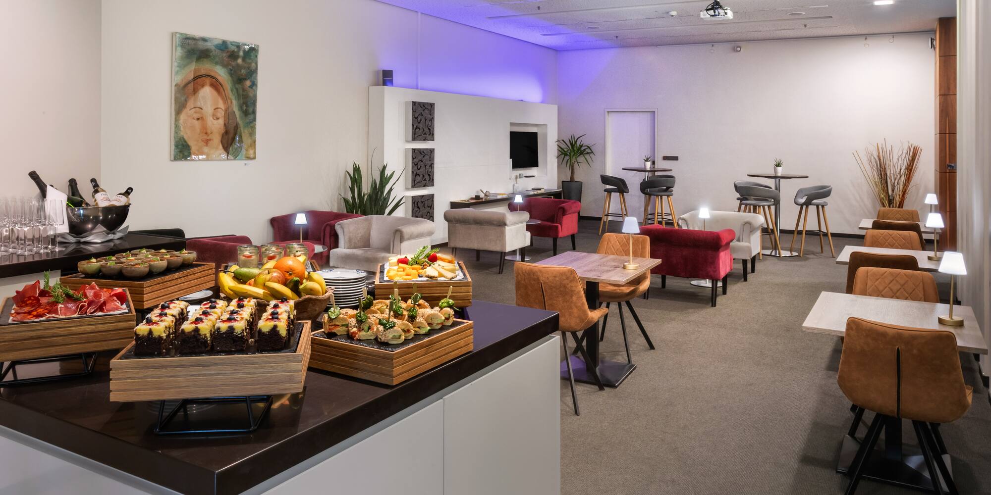 a room with a table and chairs and tables and chairs