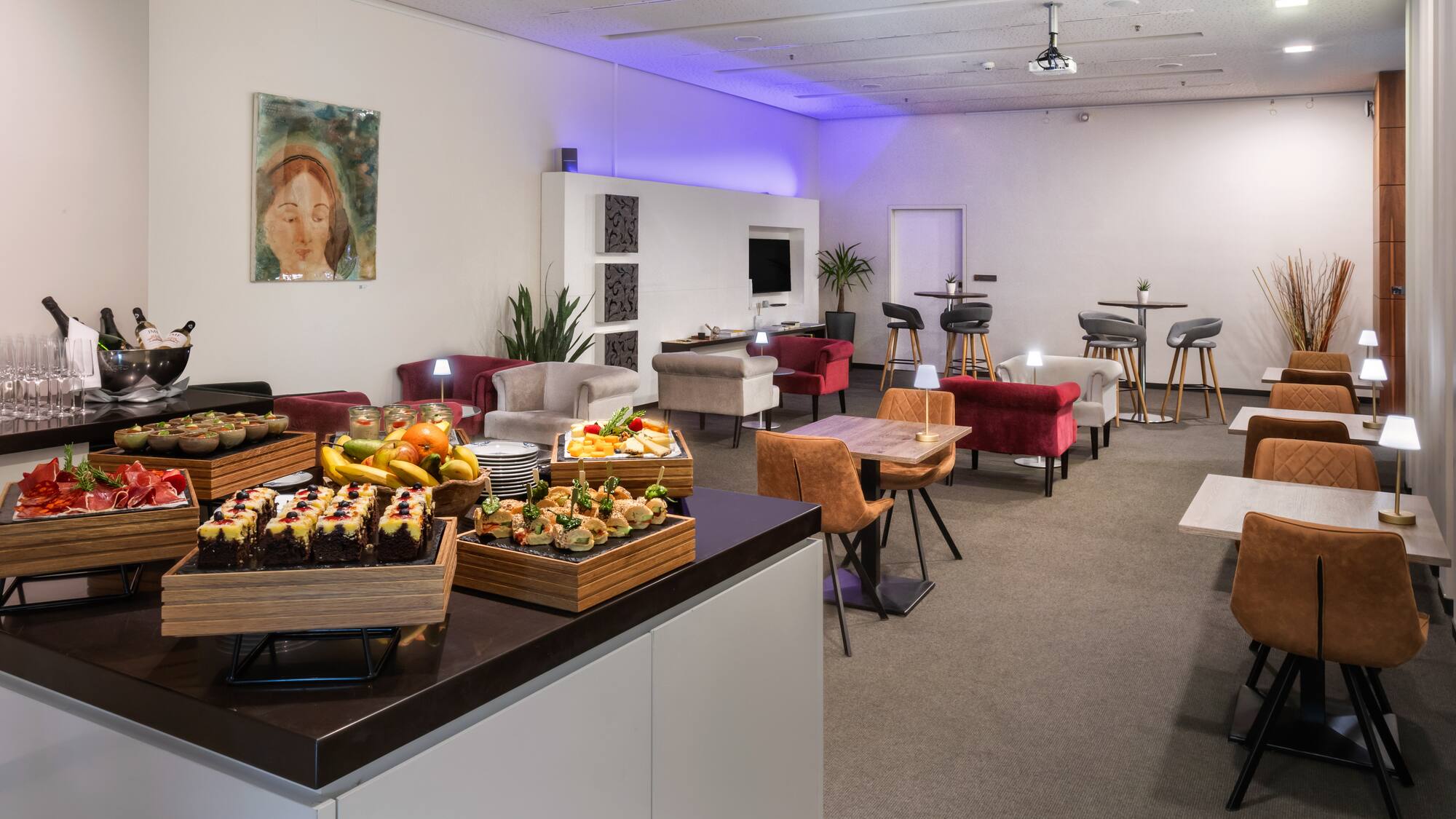 a room with a table and chairs and tables and chairs