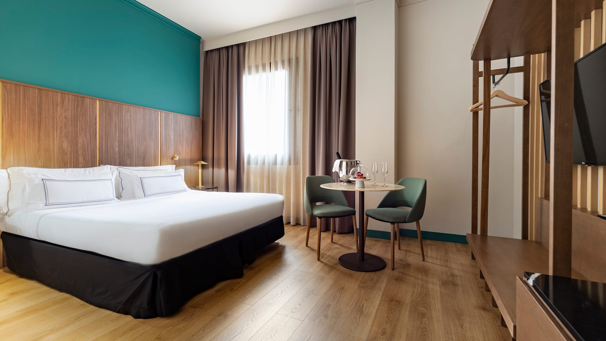 a room with a bed and a table