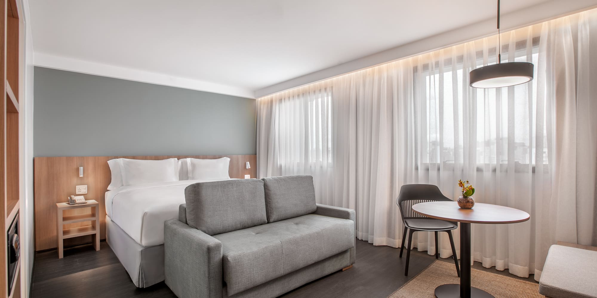 a room with a bed and a table