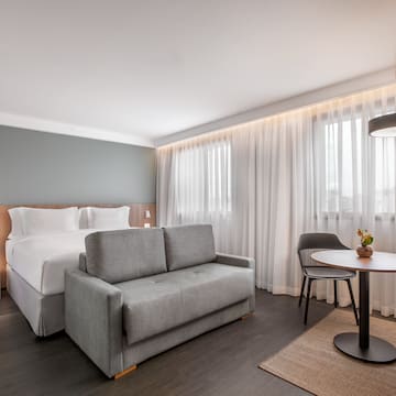 a room with a bed and a table