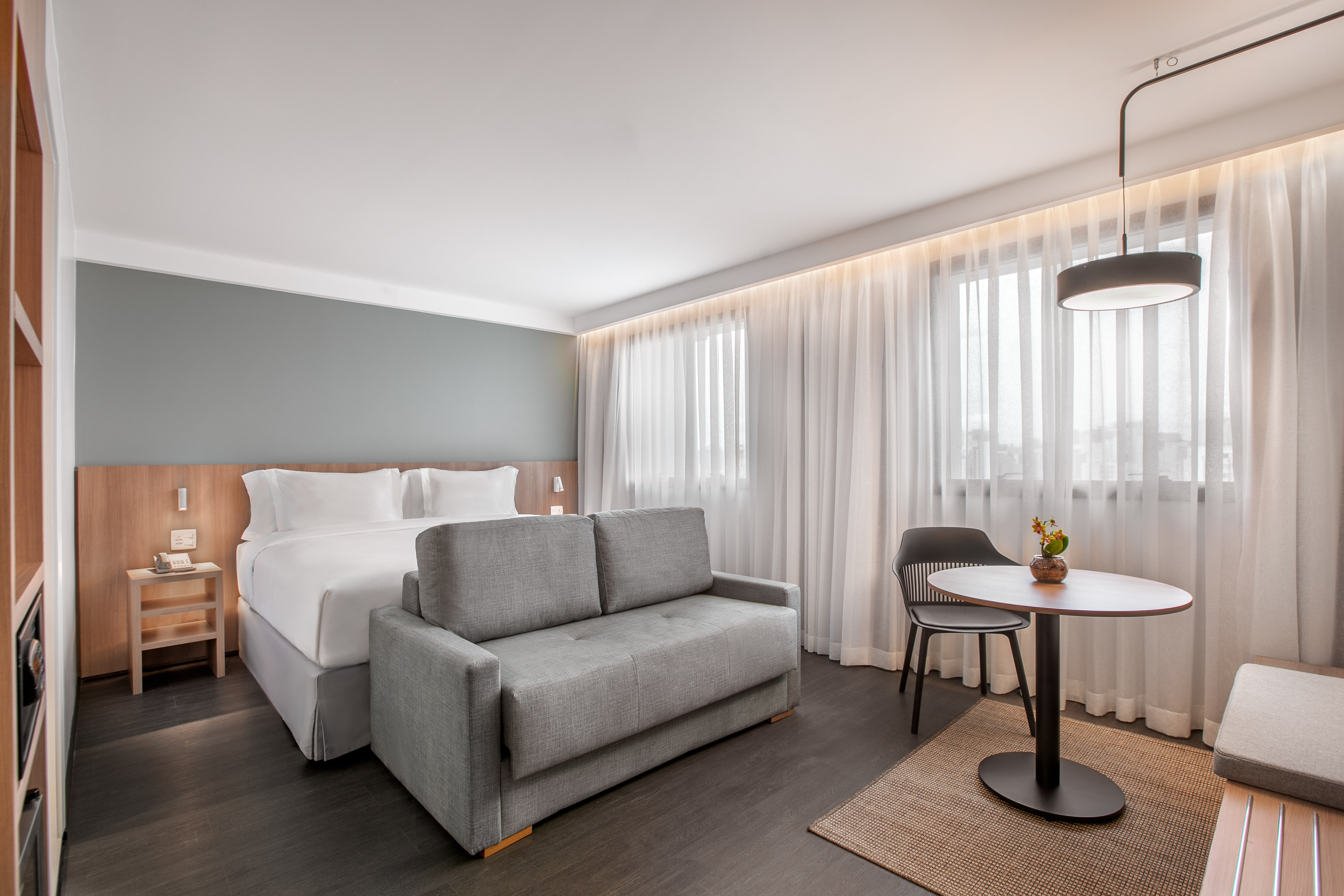 a room with a bed and a table