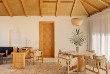 a room with a table and chairs