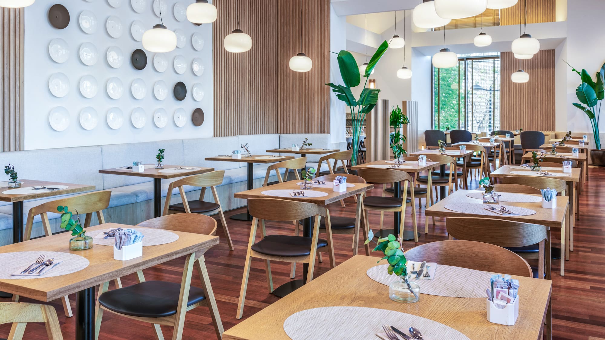 a room with tables and chairs