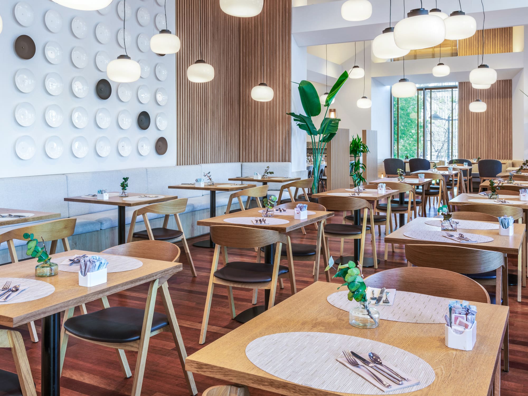 a room with tables and chairs.