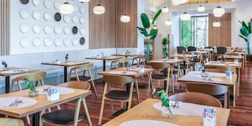 a room with tables and chairs