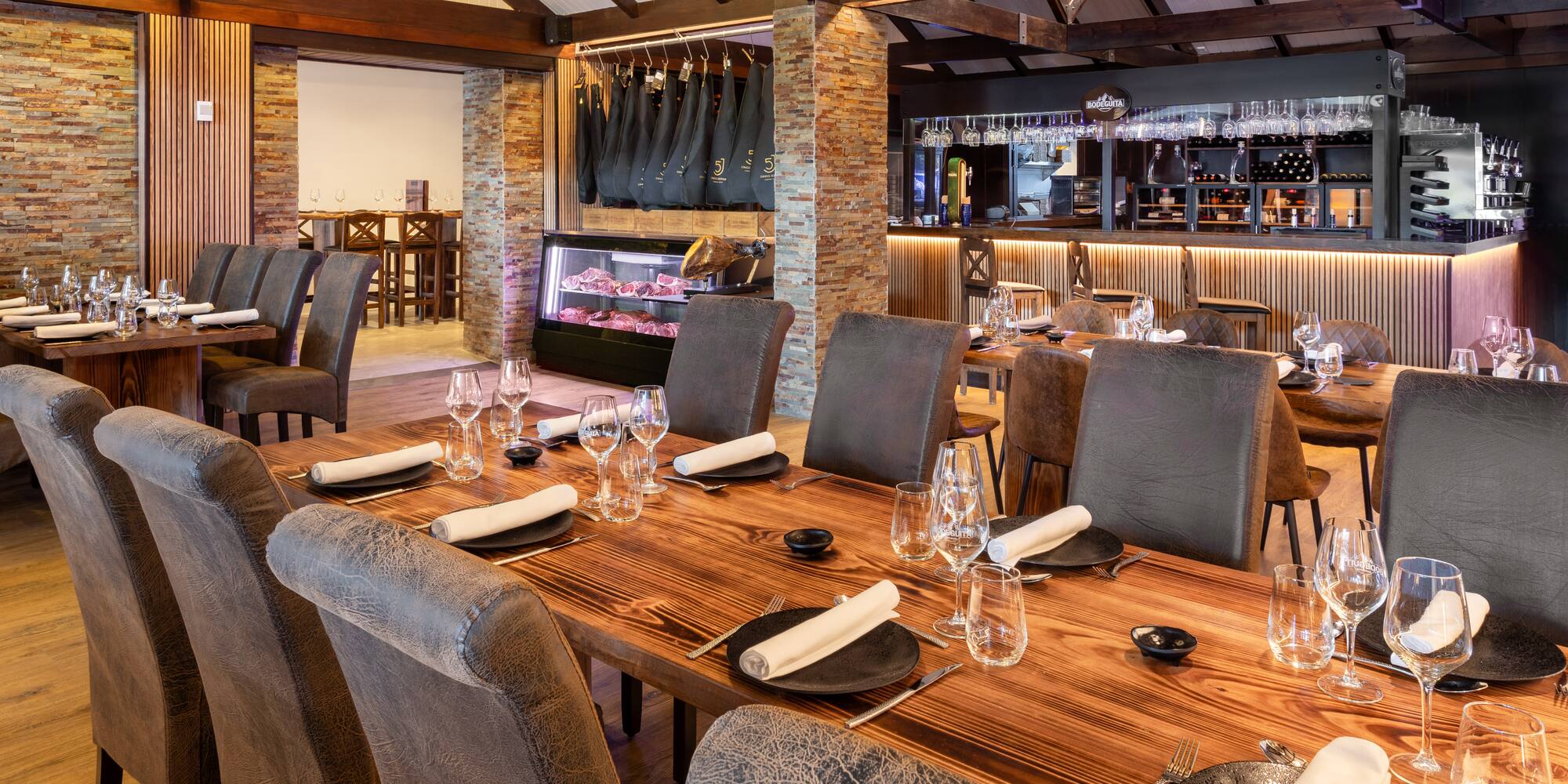 a restaurant with a large table set up