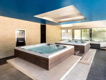 a large hot tubs in a room