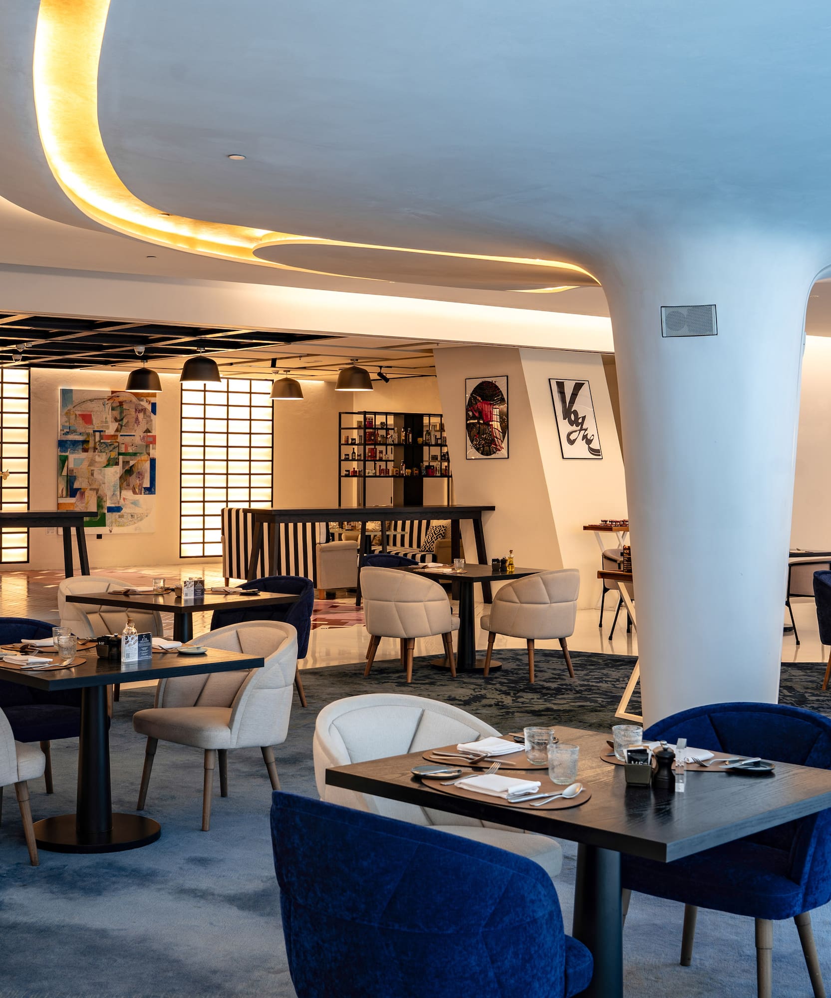 a room with tables and chairs