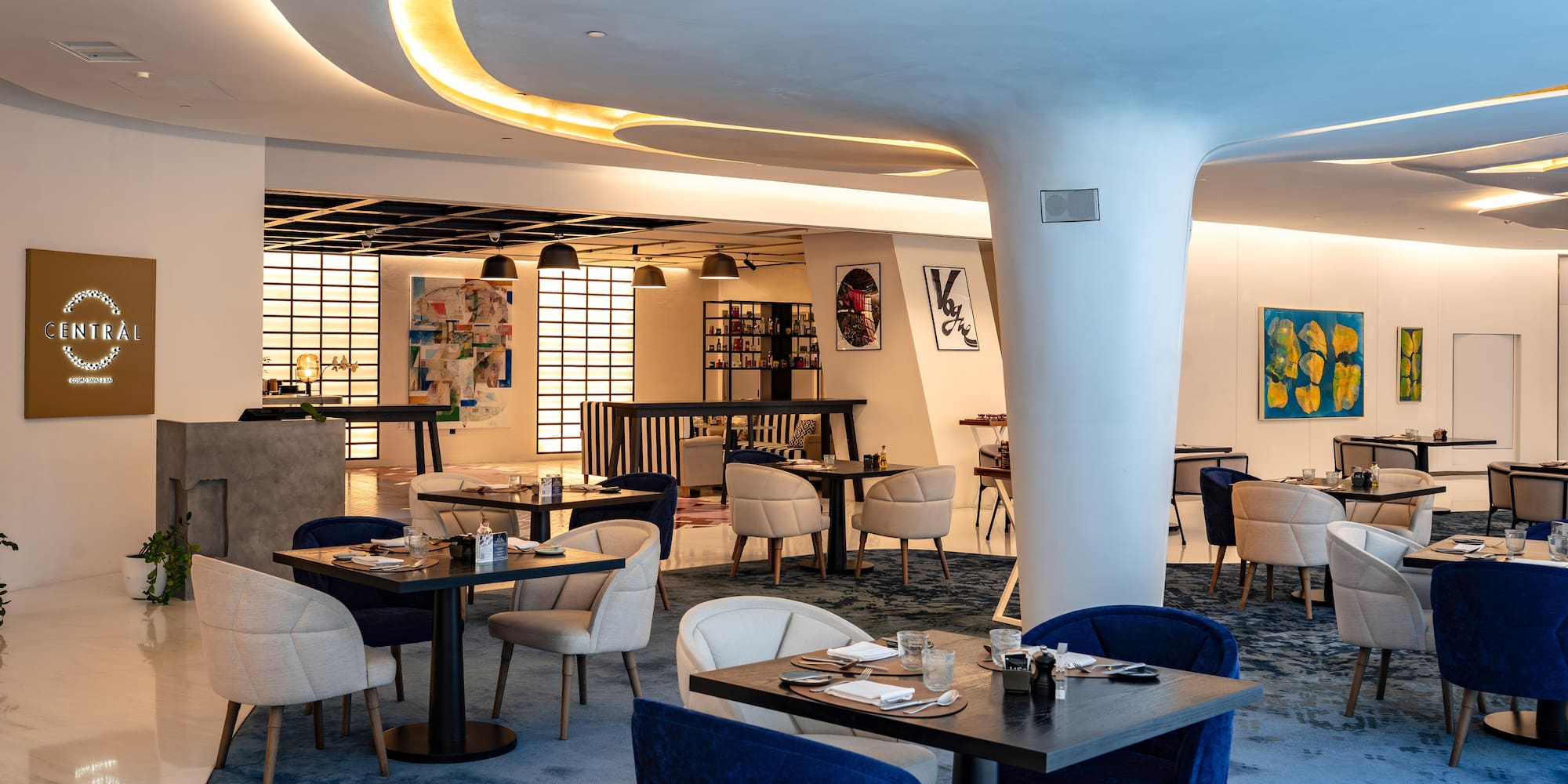 a room with tables and chairs