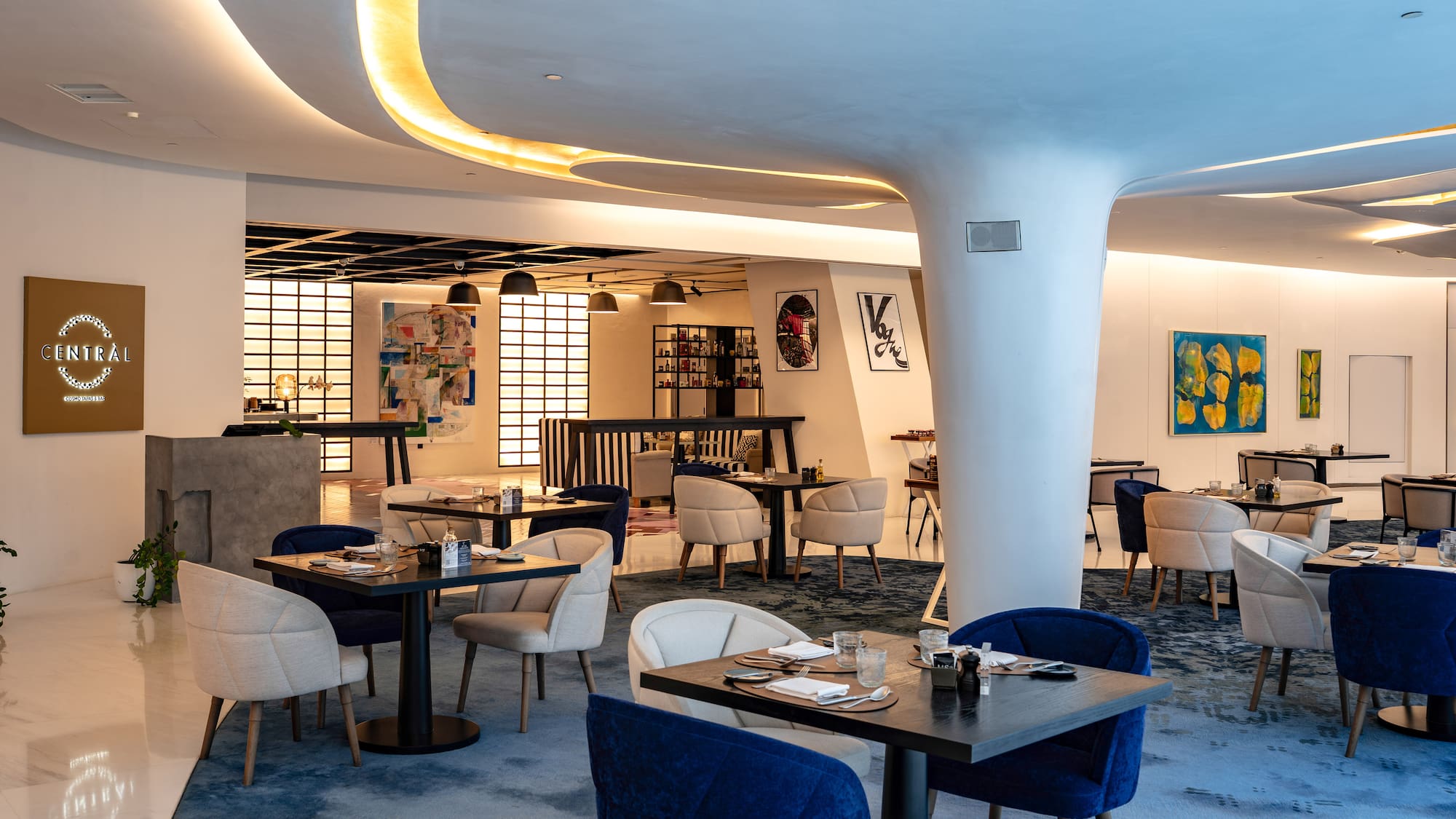 a room with tables and chairs