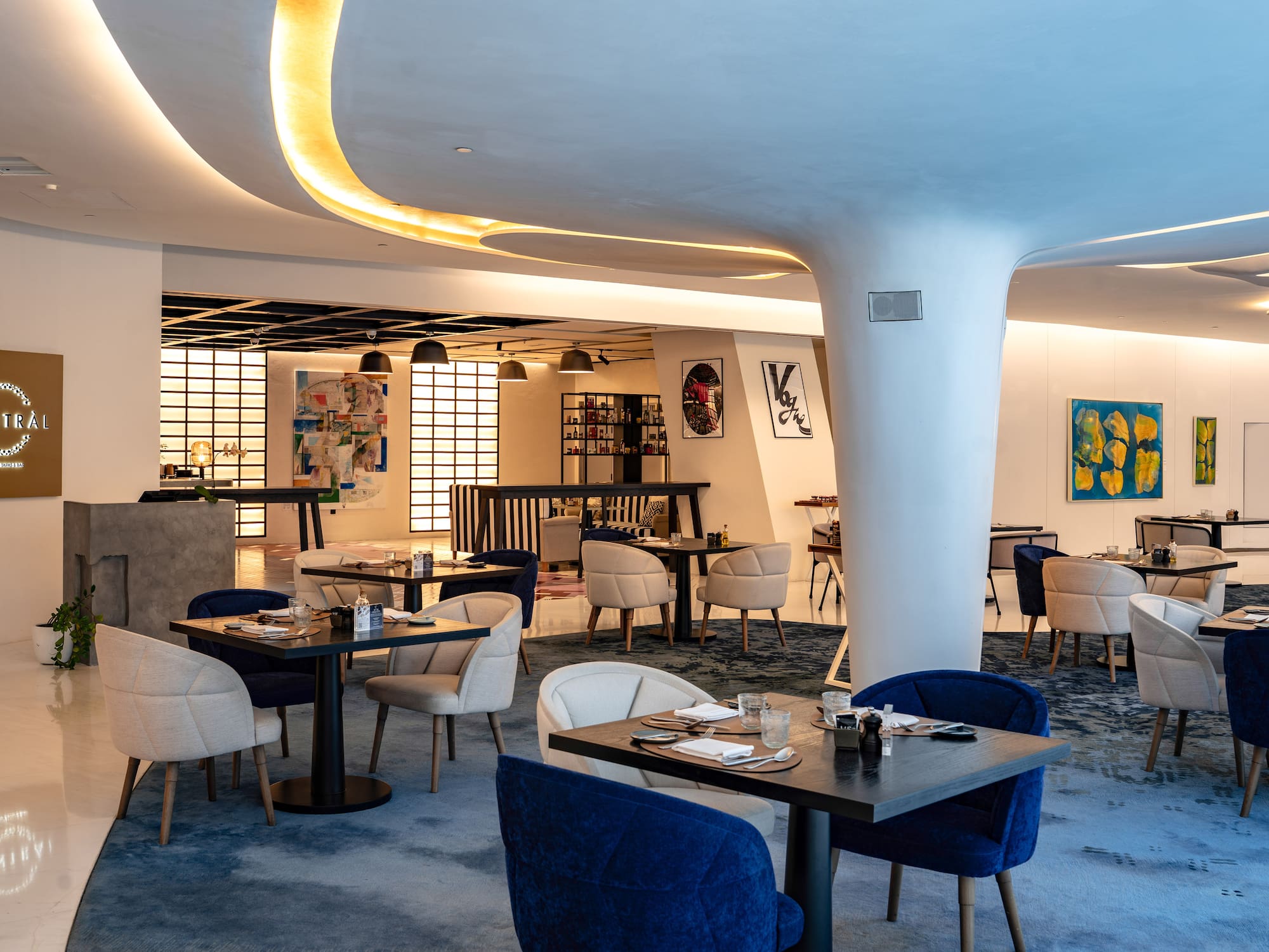 a room with tables and chairs