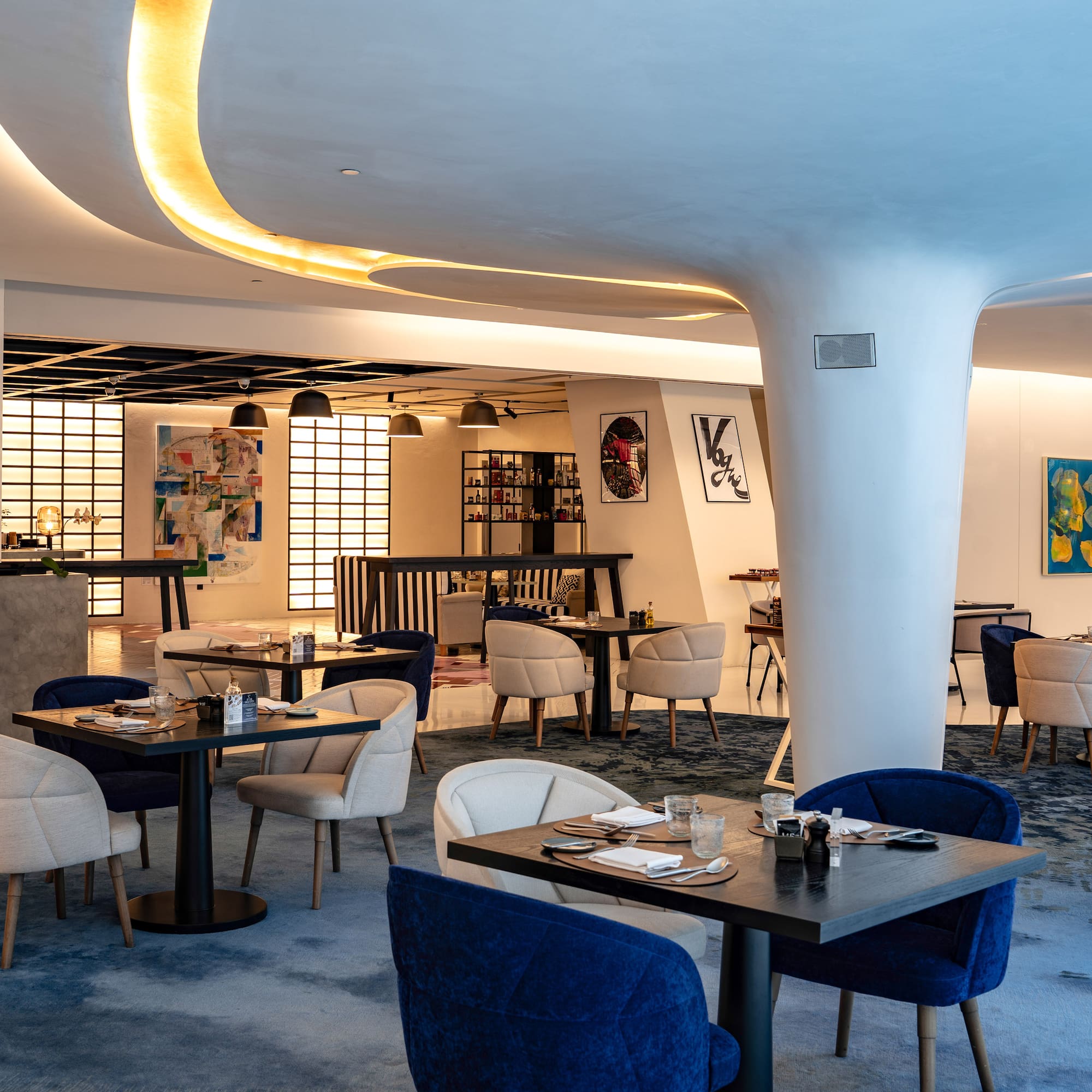 a room with tables and chairs