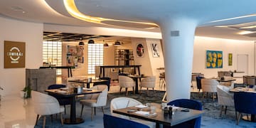a room with tables and chairs