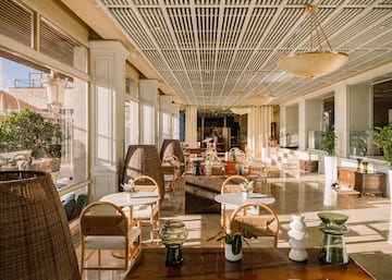 a room with tables and chairs