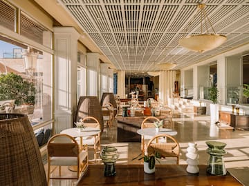 a room with tables and chairs