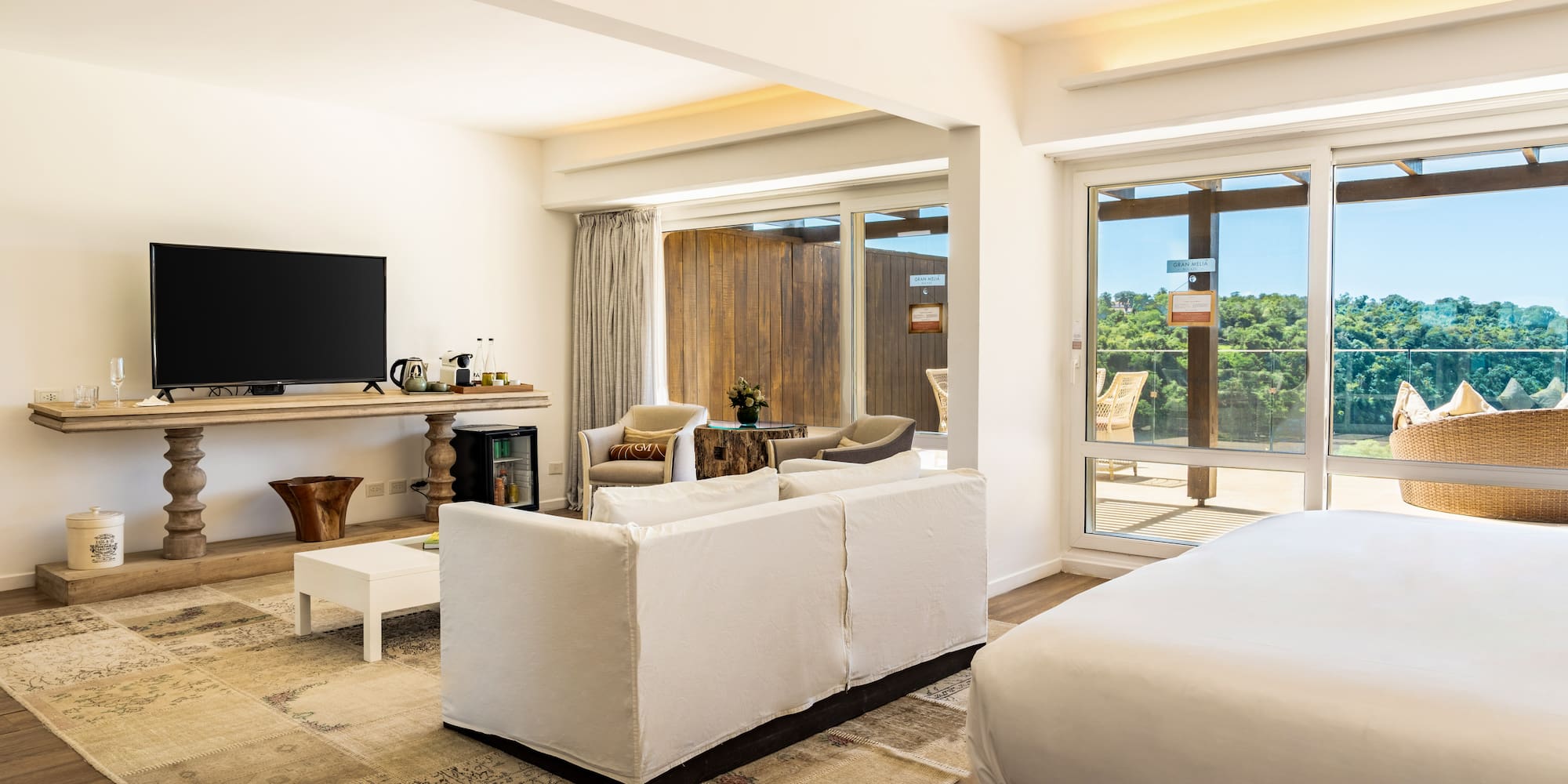 a room with a television and a bed