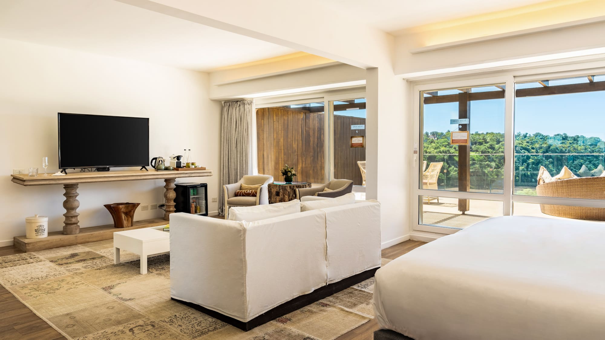 a room with a television and a bed