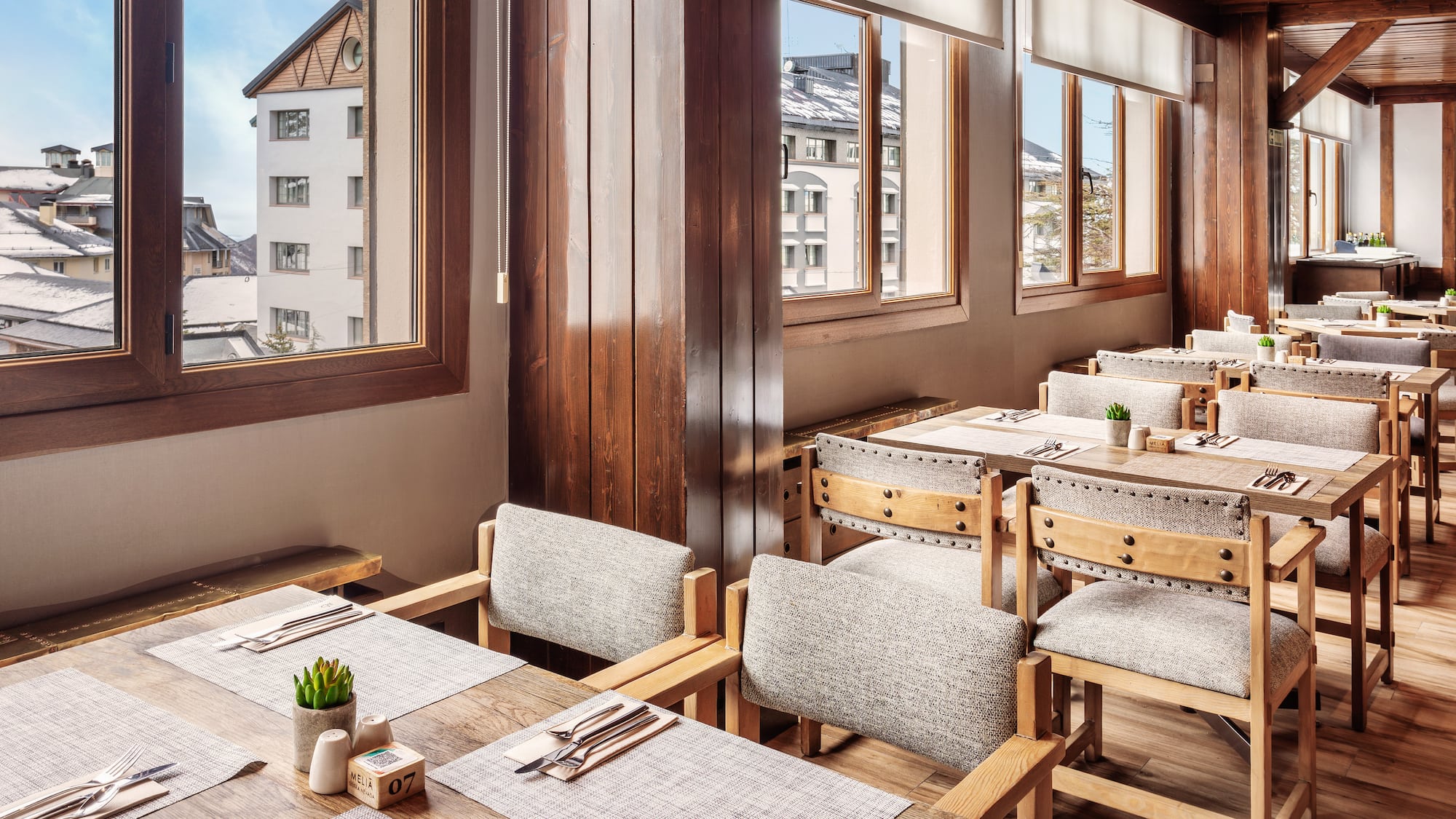 a room with tables and chairs