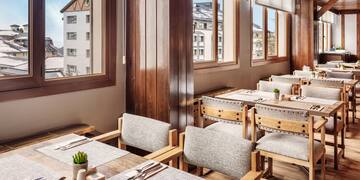 a room with tables and chairs