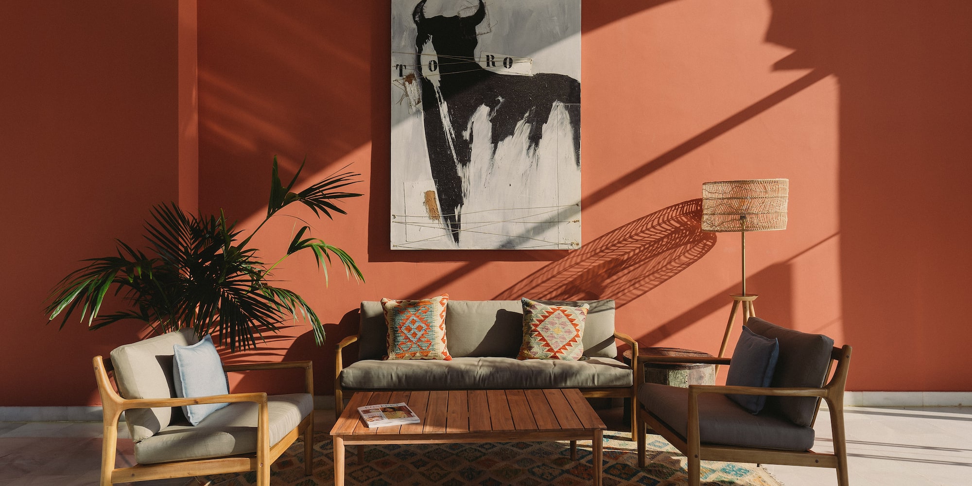 a living room with a couch and a table