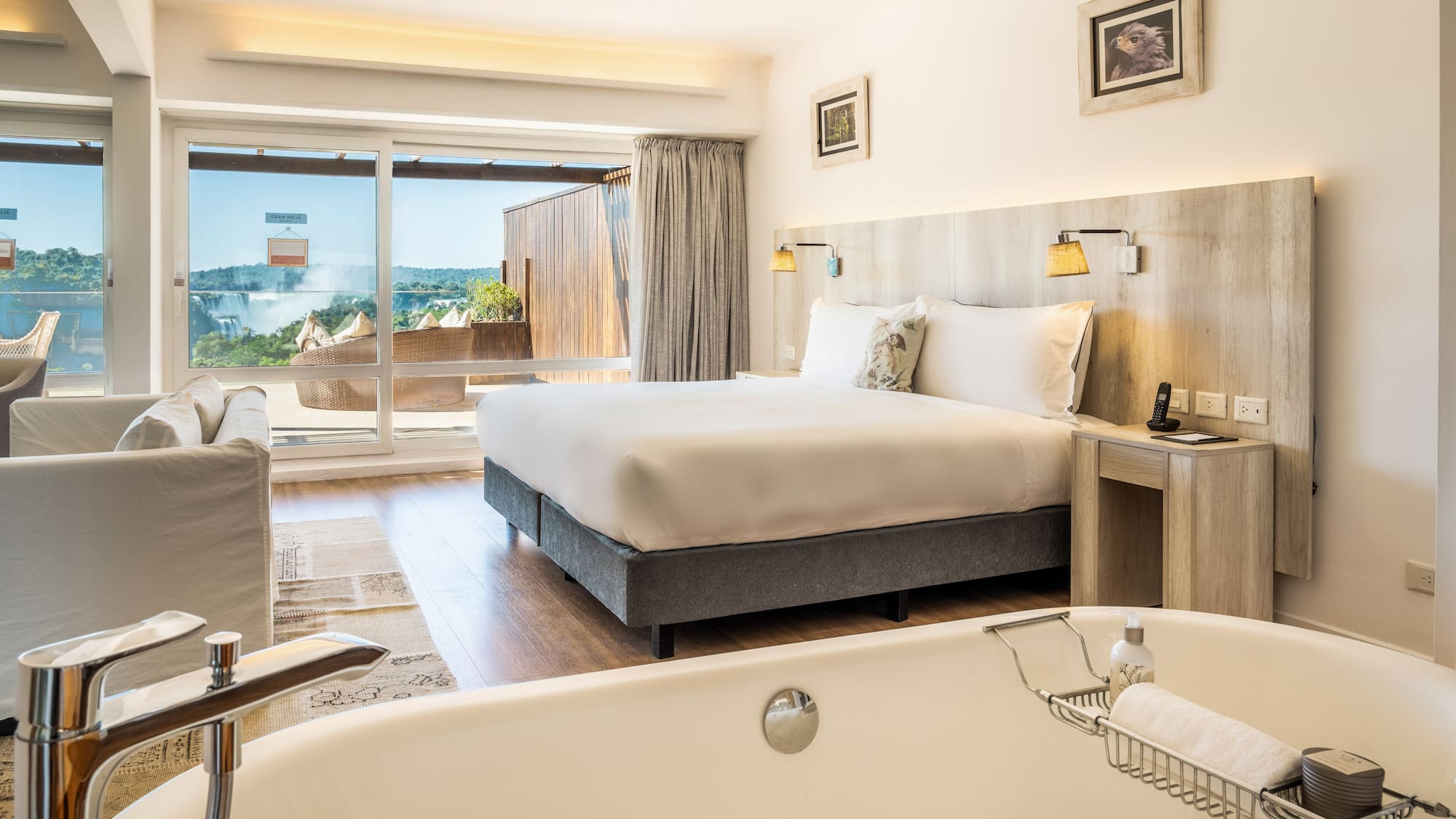 a room with a bed and a bathtub