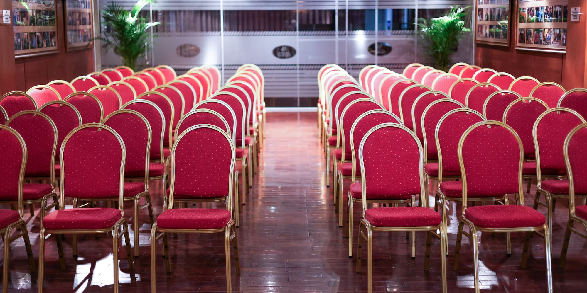 a room with red chairs