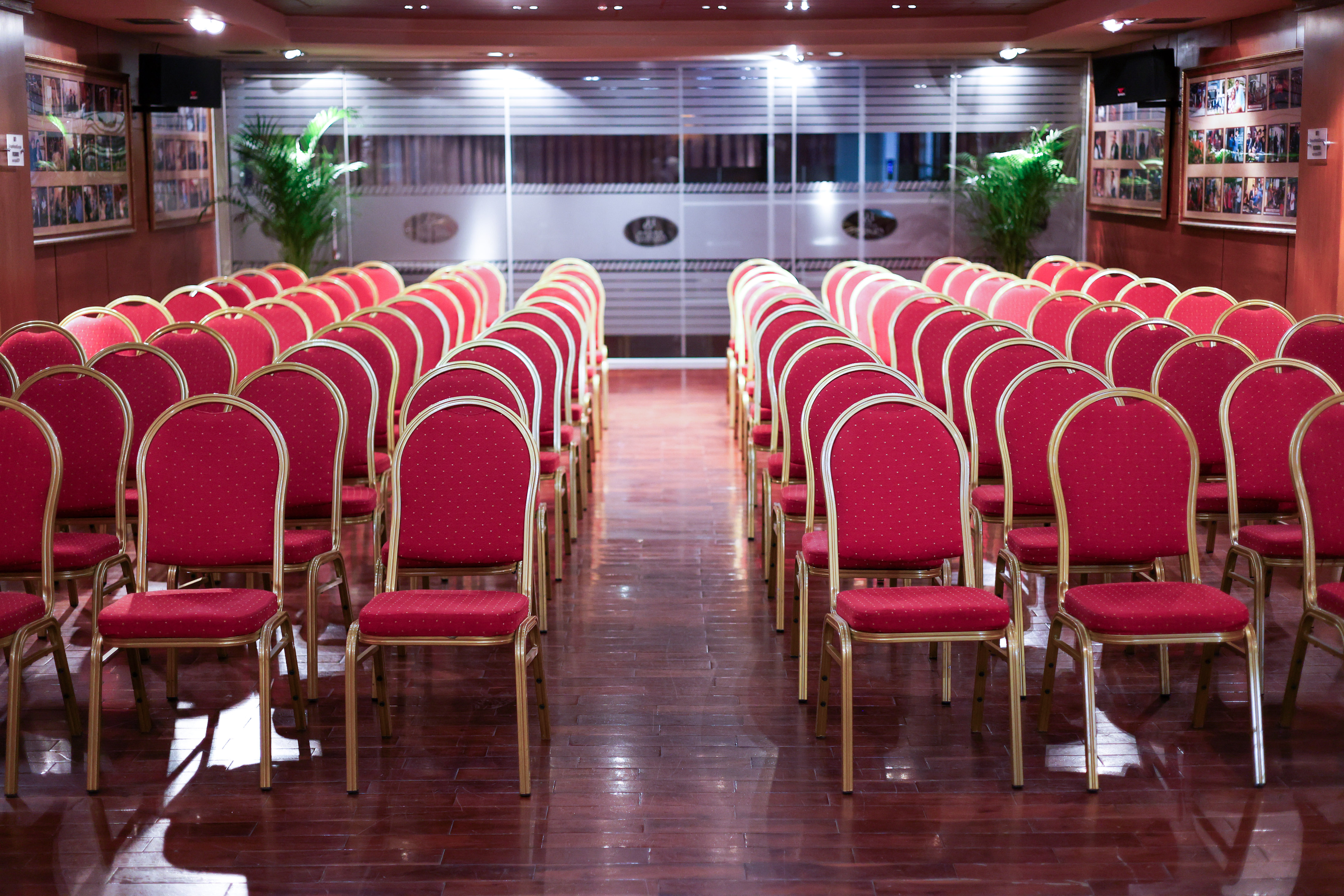 a room with red chairs
