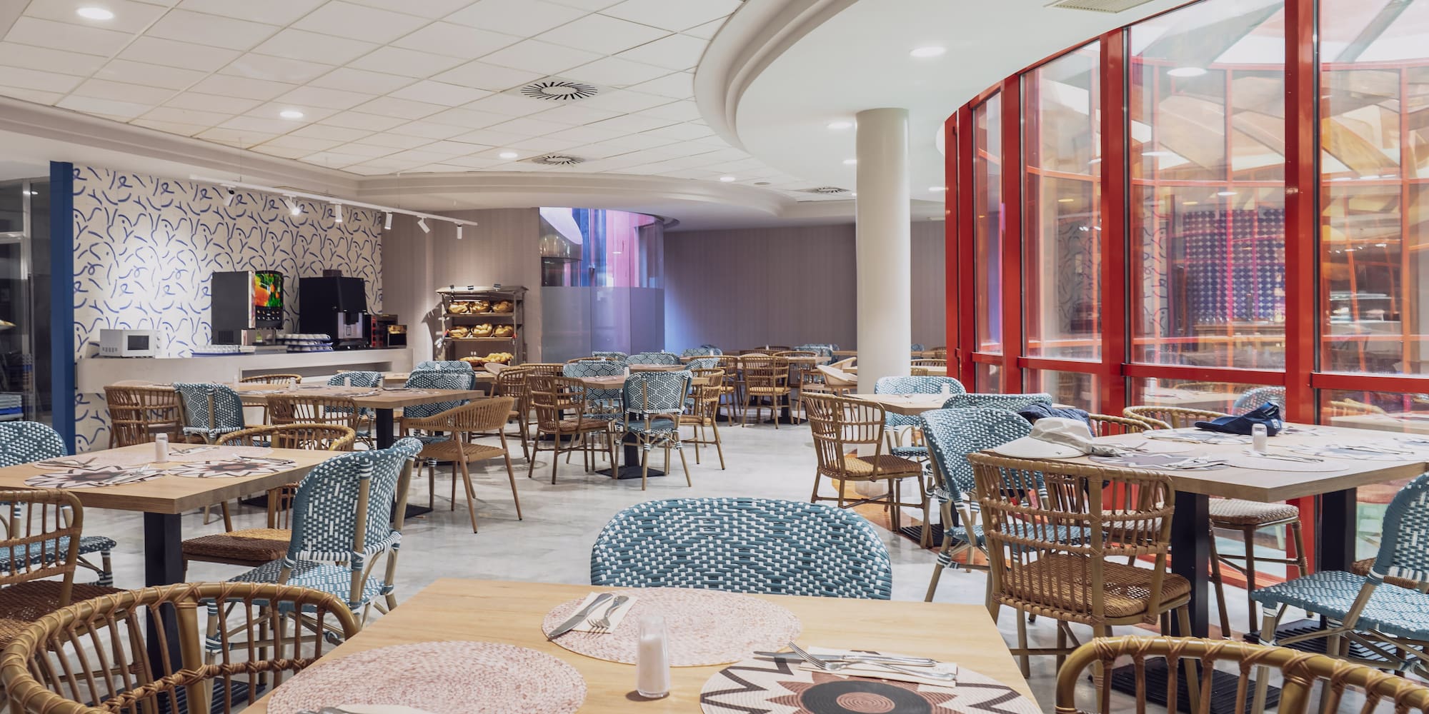 a room with tables and chairs