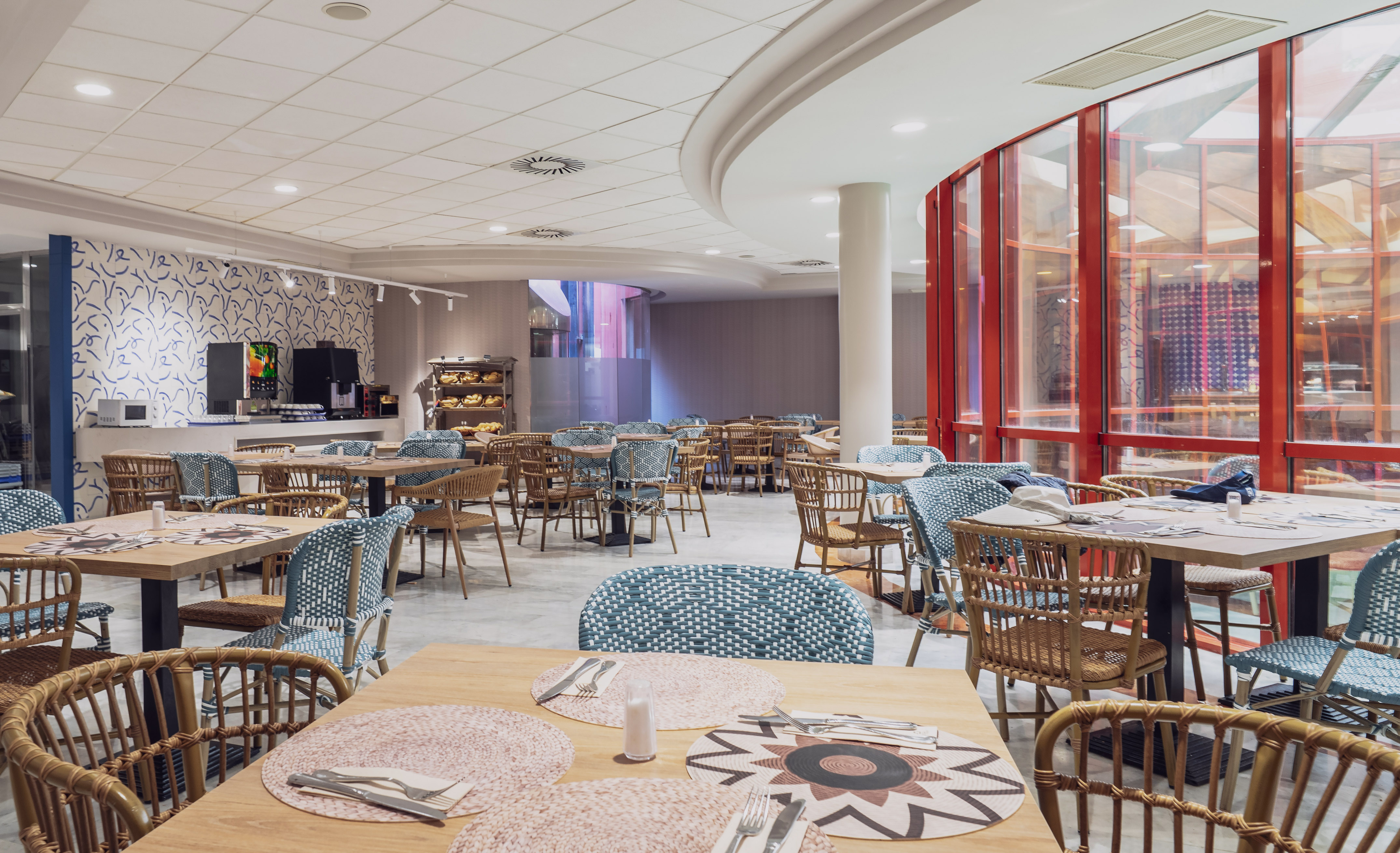 a room with tables and chairs