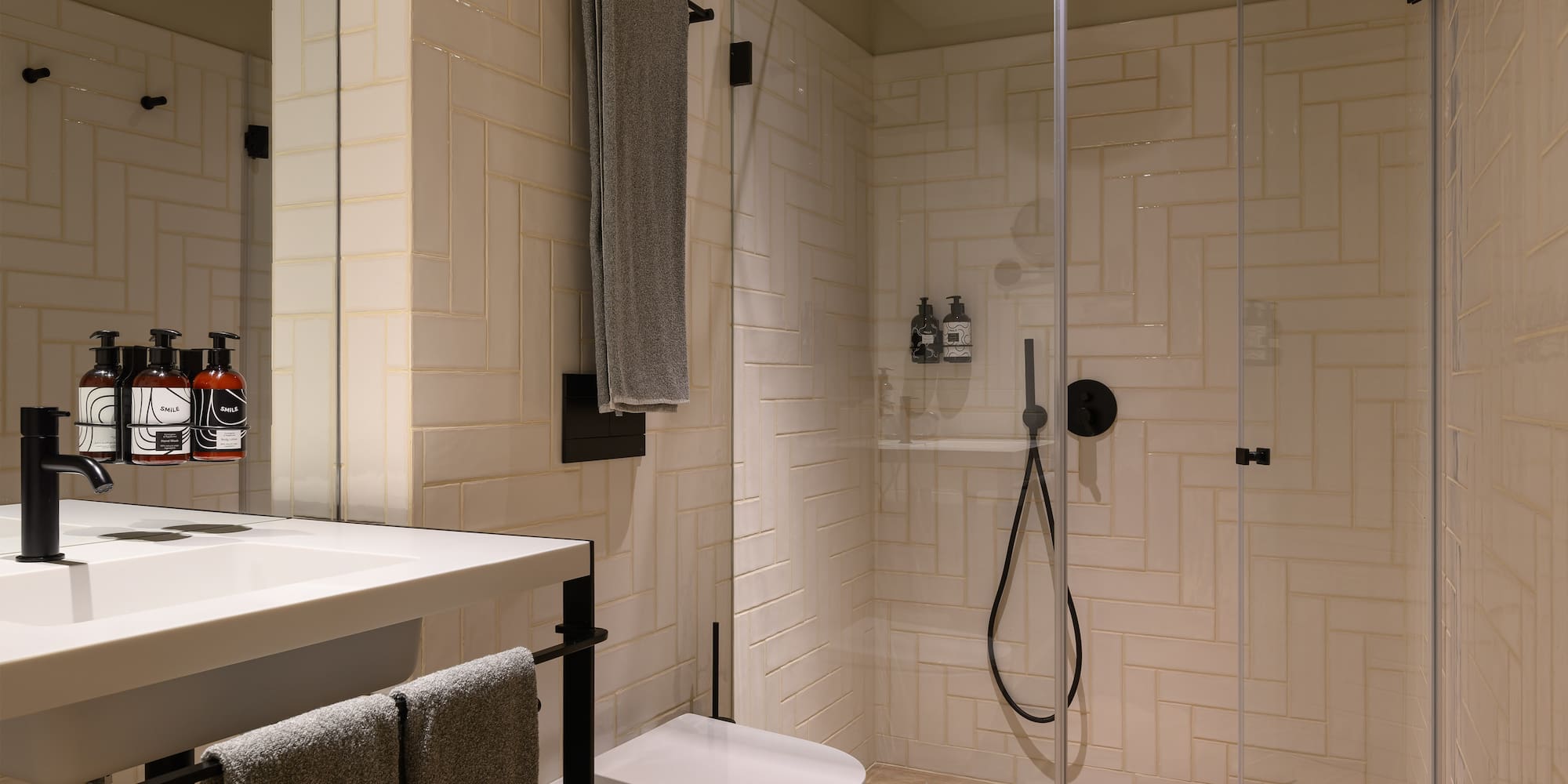 a bathroom with a shower and toilet