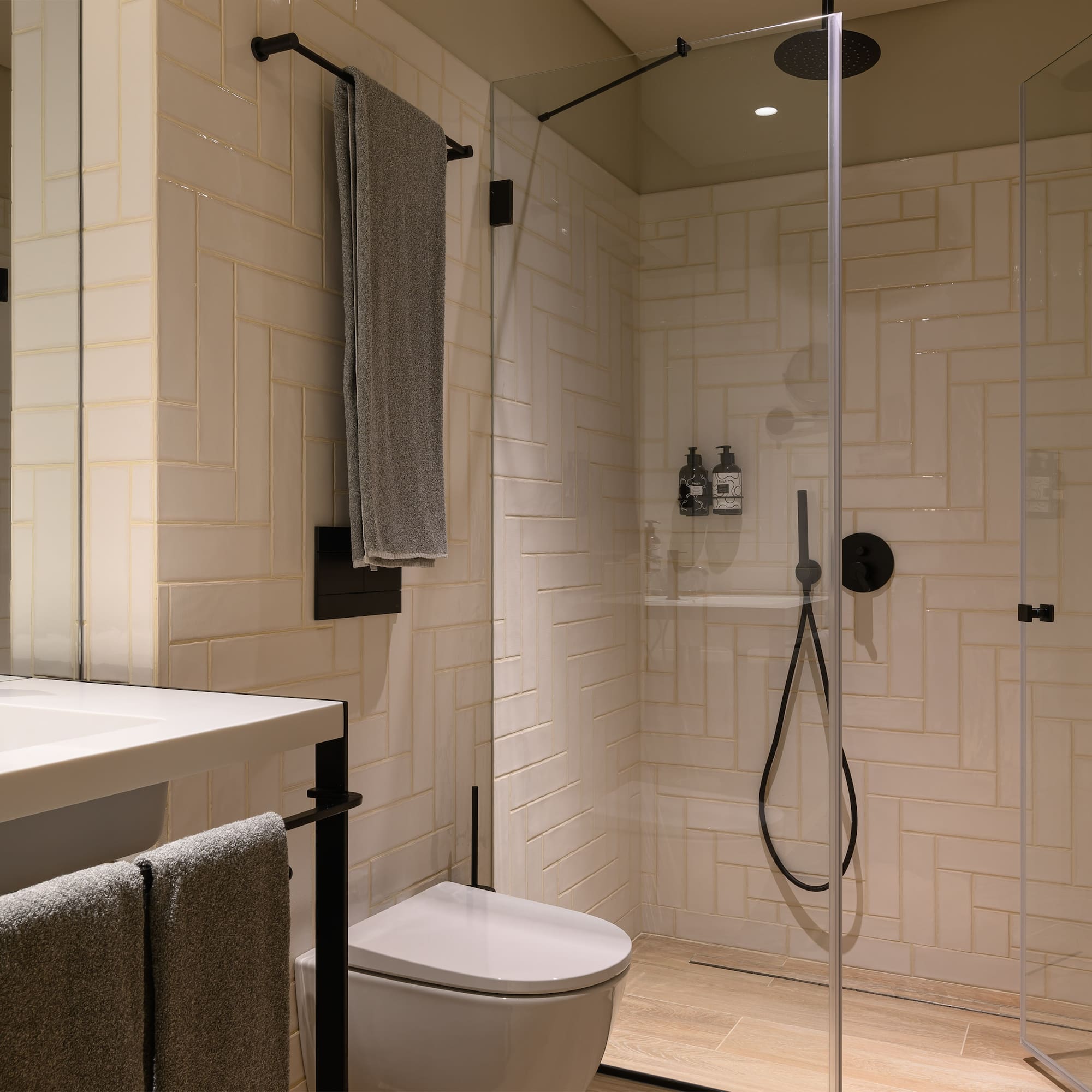 a bathroom with a shower and toilet