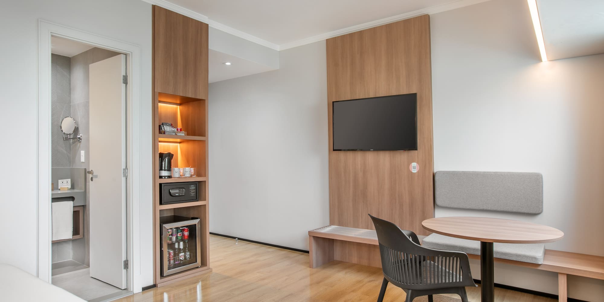 a room with a table and chairs