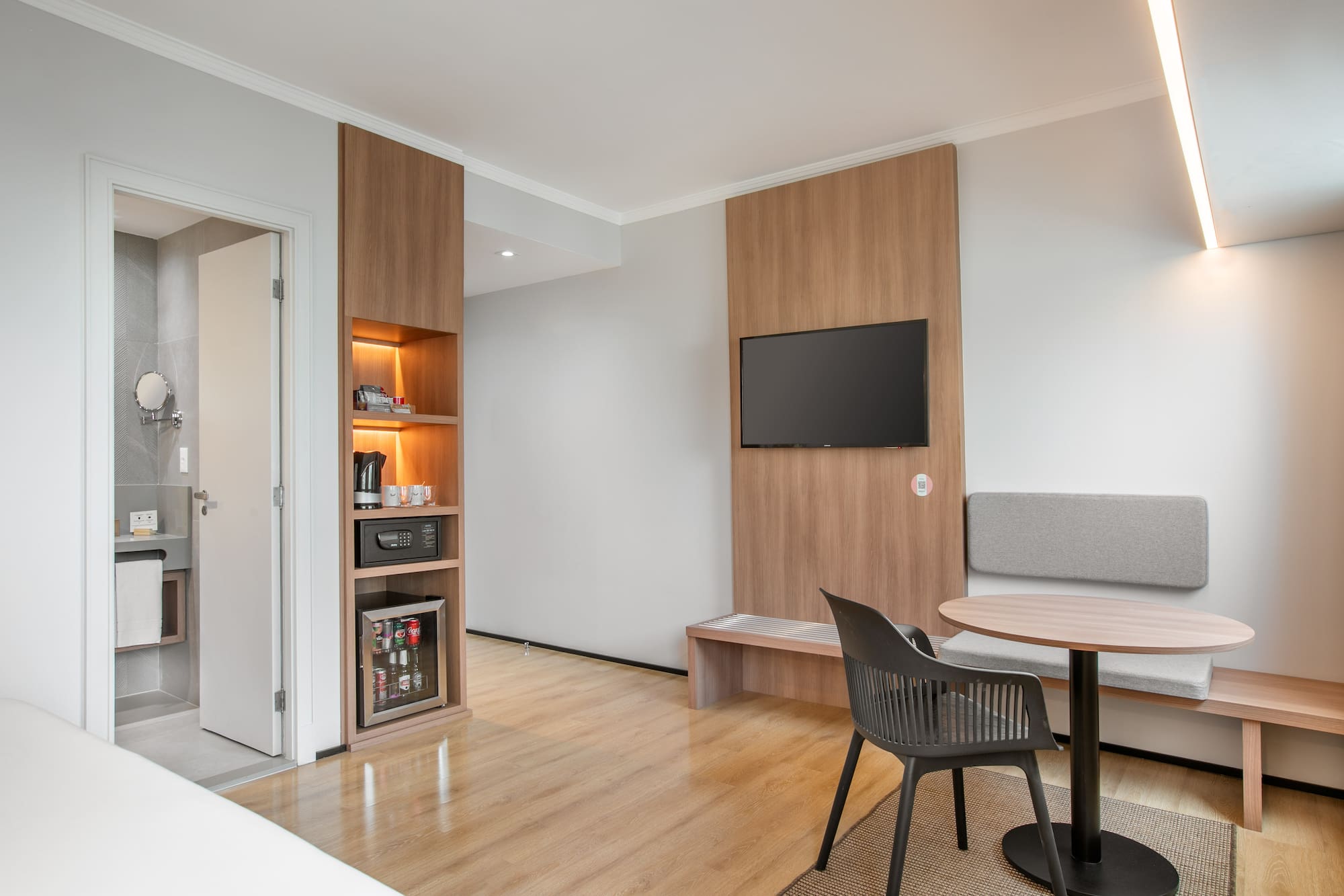 a room with a table and chairs