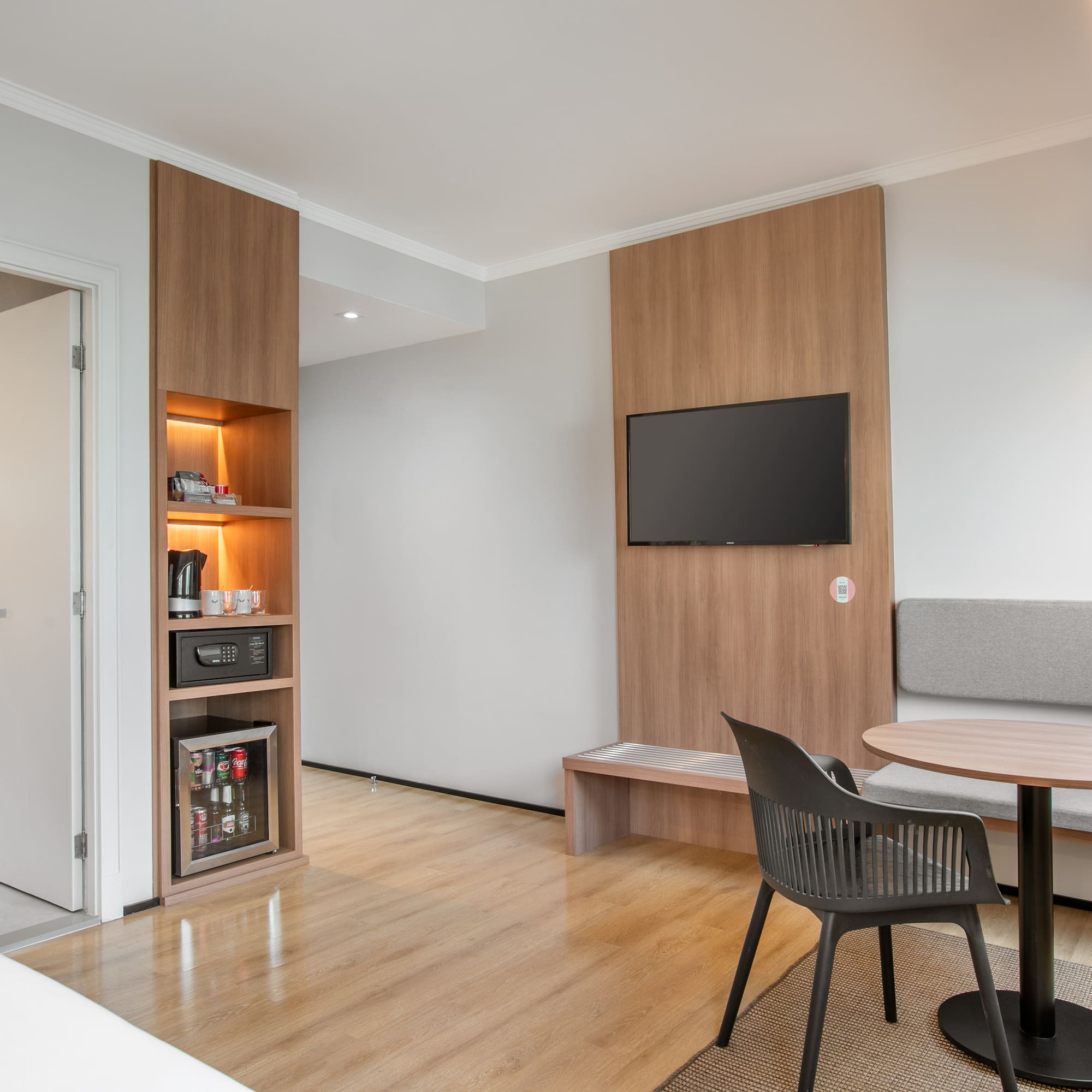 a room with a table and chairs