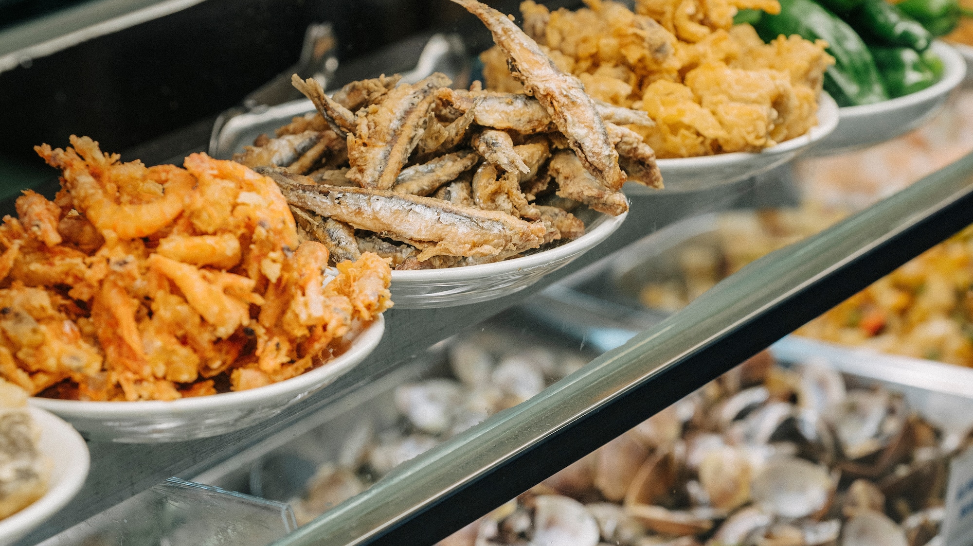 a display case with different types of food