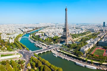 a eiffel tower and a river